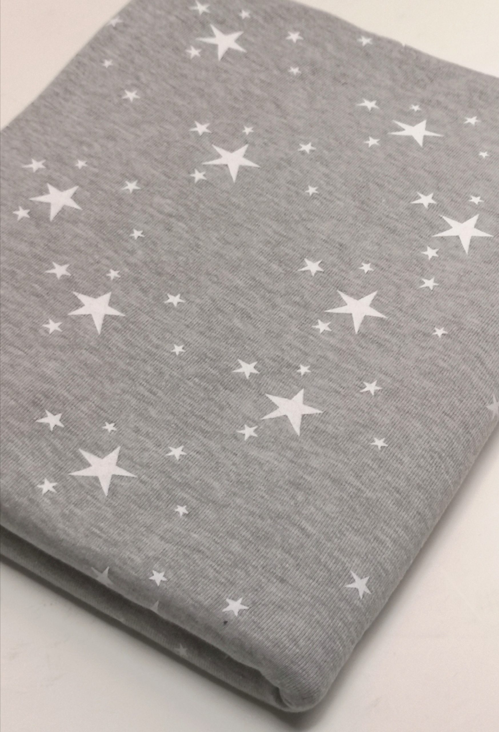 Cotton Knit – White Stars on Melange Grey | FabricStore